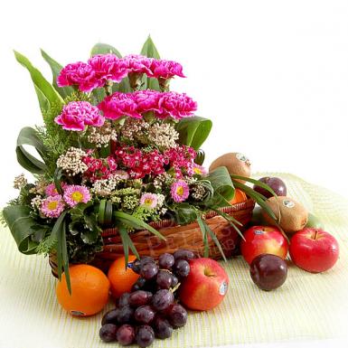 Fruity Treat - Fresh Fruits Basket with Carnation Flowers