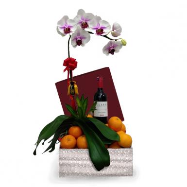 Wealth Heaps - Phalaenopsis Orchid with Tangerines & Luis Felipe Edwards Merlot