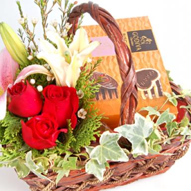Scrumptious Godiva - Belgian Chocolate Biscuits Flowers Basket